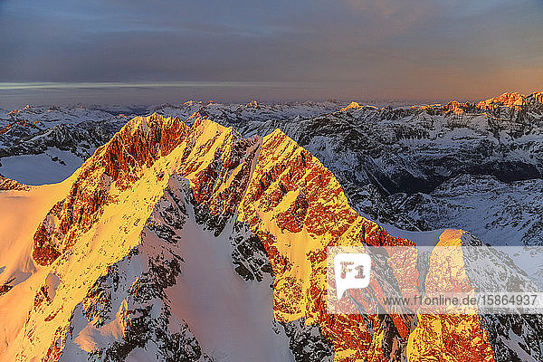 Aerial view of Mount Disgrazia and Bernina Group at sunset Masino Valley Valtellina Lombardy Italy Europe