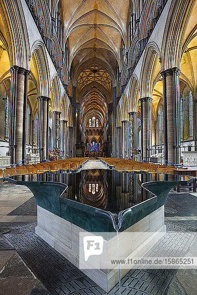 Looking down the nave and across the font in Salisbury Cathedral  Salisbury  Wiltshire  England  United Kingdom  Europe