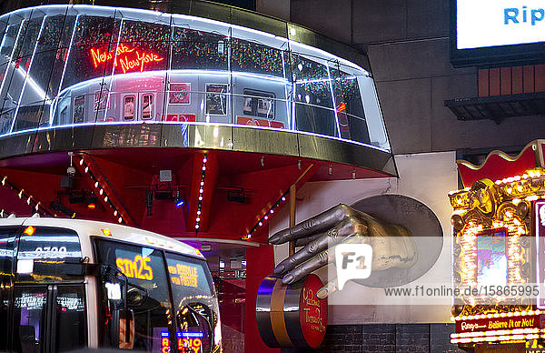 Hand sculpture and sign outside Madame Tussauds Wax Museum Manhattan; New York City New York United States of America