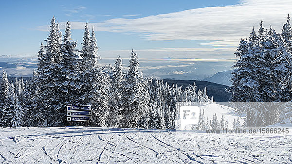 Sign for three ski runs at Sun Peaks Resort in the Rocky Mountains; Sun Peaks British Columbia Canada