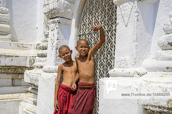 Junior monks at a temple being silly for the camera; Bagan Myanmar
