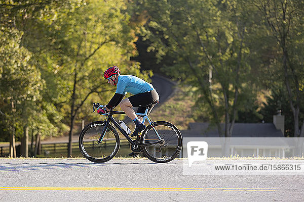 Cyclist riding on a road  near Trace Nachez Bridge; Franklin  Tennessee  United States of America