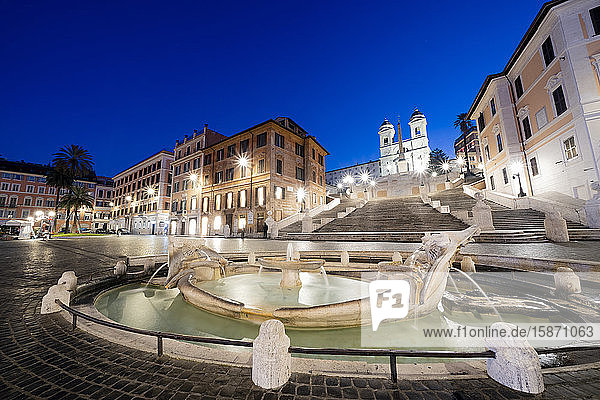 Piazza di Spagna (Spanish Steps) with Barcaccia fountain in foreground and Trinita†dei Monti in background Rome Lazio Italy Europe