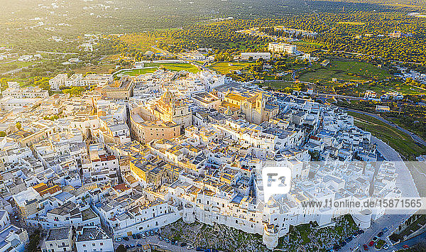 Aerial view by drone of the old town of Ostuni at sunset Apulia Italy Europe