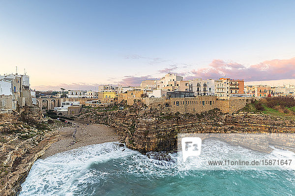 Sunrise with view on the beach of Lama Monachile from above Polignano a Mare Apulia Italy Europe