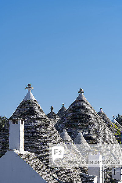 Conical dry stone roofs on traditioanl houses in Alberobello UNESCO World Heritage Site Bari Province Puglia Italy Europe