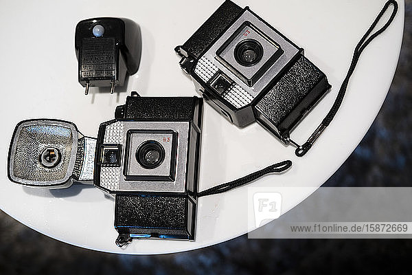 Antique cameras on table