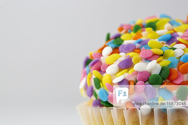 Cupcake with colorful sprinkles