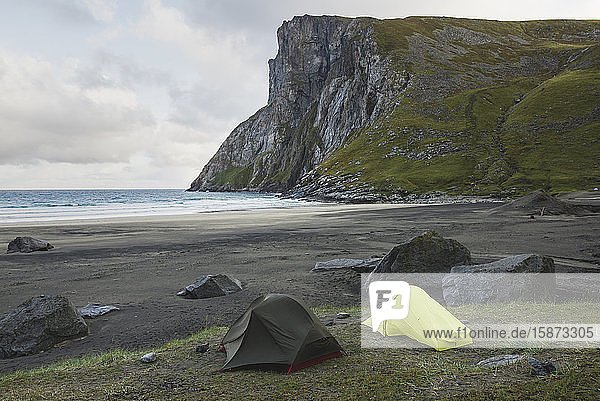 Tents on Kvalvika beach in Lofoten Islands Norway