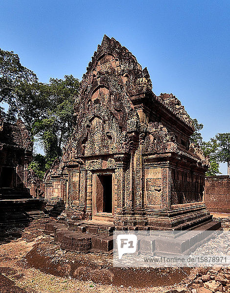 Cambodia  in north of Angkor  Cambodia. Banteay Srei (or Banteay Srey  meaning Citadel of women) is a 10th century Cambodian temple  built largely of red sandstone  and dedicated to the Hindu god Shiva. Angkor used to be the seat of the Khmer empire  which flourished from approximately the ninth century to the thirteenth century. The ruins of Angkor temples are a UNESCO World Heritage Site.