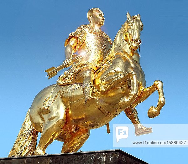 Illustration golden statue of Vladimir Putin as tsar on horseback holding a missile