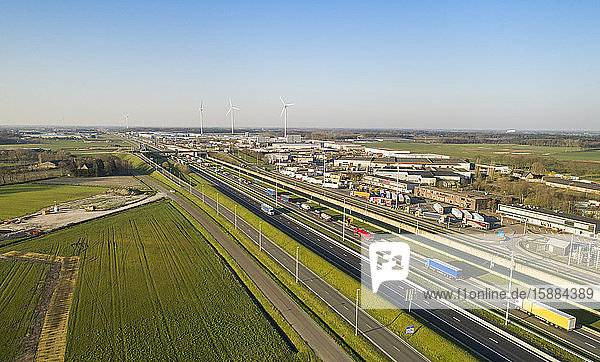 Aerial view of a motorway  a border point with traffic queuing to cross the Dutch Belgian border.