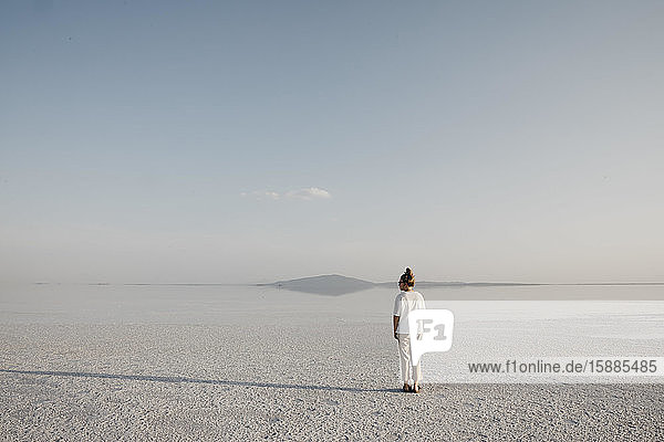 Rear view of woman standing at Lake Karum  Danakil Depression  Ethiopia  Afar