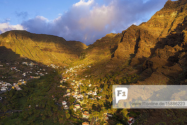Spain  Santa Cruz de Tenerife  Valle Gran Rey  Aerial view of village in mountain valley at dusk