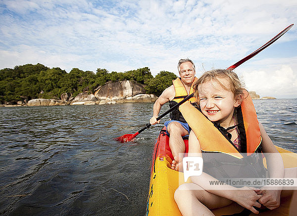 Father and daughter canoeing together  Koh Samui  Thailand