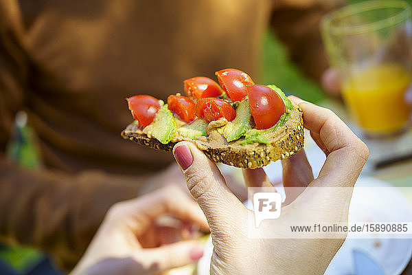 Vegan bread with avocado and cherry tomatoes