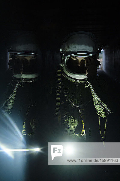 Young spaceman lost in the dark