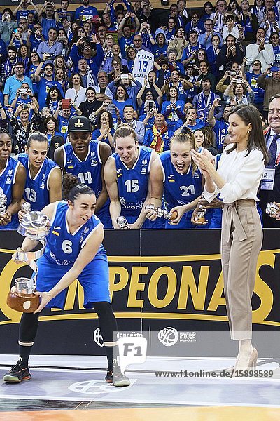 Queen Letizia of Spain hands Silvia Dominguez of Perfumerias Avenida the Queen Cup trophy during ‘Spanish Queen's Cup’ Basket Final match between Perfumerias Avenida (winner) and Uni Girona at Pabellon Multiusos Sanchez Paraiso on March 8 2020 in Salamanca Spain