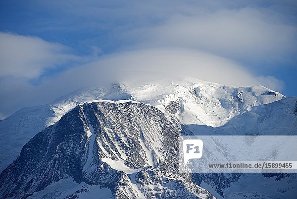 France Haute-Savoie (74) Alps Mont Blanc (4807 m) and Mont Blanc mountain range with lenticular cloud.