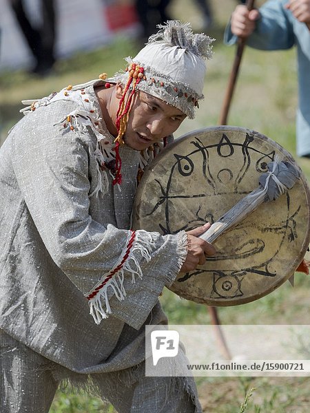 A Shaman recounting the myth. Folk Festival commemorating the origin myth the Tien Shan Maral (Tian Shan wapiti) an origin myth of the Kyrgyz tribes. Near Tasch Baschat Naryn region. Asia Central Aisa