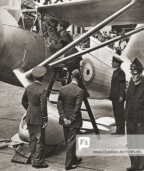 EDITORIAL Edward VIII seen here on an R. A. F. inspection tour. Edward VIII later Duke of Windsor 1894-1972. From The Coronation Souvenir Book published 1937.