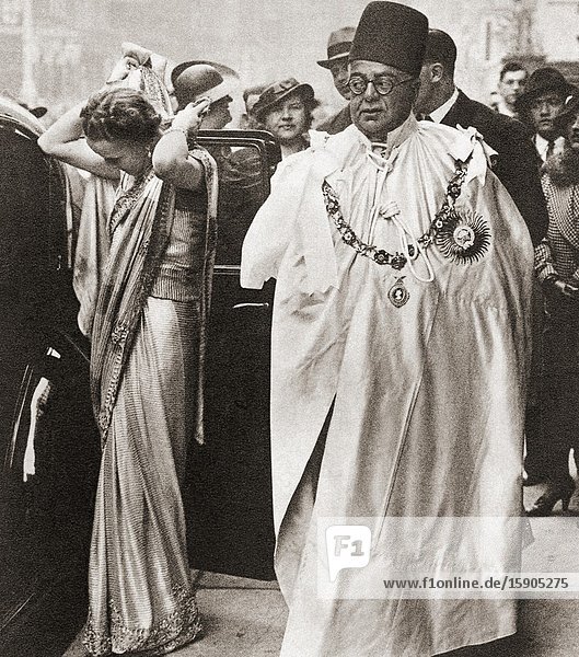 EDITORIAL The Aga Khan III with his wife Begum Om Habibeh Aga Khan seen here at the coronation of George VI and Queen Elizabeth 1936. Sir Sultan Mahomed Shah Aga Khan III 1877-1957. 48th Imam of the Nizari Ismaili religion. Begum Om Habibeh Aga Khan 1906-2000. From The Coronation Souvenir Book published 1937.