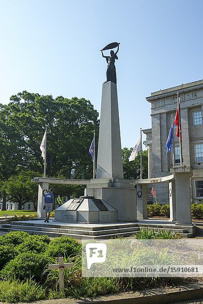 MEMORIAL TO VETERANS OF WORLD WAR I WORLD WAR II AND THE KOREAN WAR ERECTED 1990 Raleigh a city in NC North Carolina and current state capitol capital statehouse.