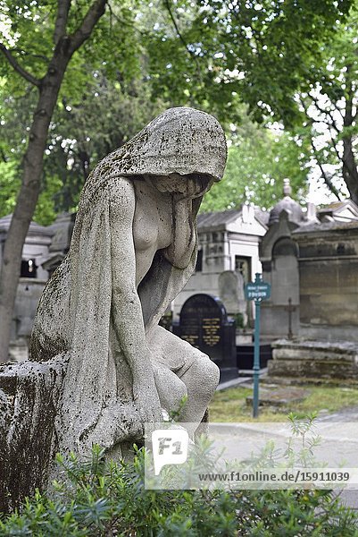 Stone statue personifying the ''Grief'' by Albert Bartholome adorning the tomb of Henri Majak (1831-1897) French librettist, Montmartre Cemetery (French: Cimetiere de Montmartre), 18th arrondissement, Paris, Ile-de-France region, France, Europe.