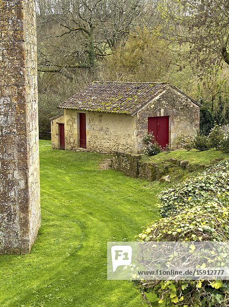 Stone outbuilding outside wall of medieval fortified village of Larressingle Gers Department Nouvelle Aquitaine France.