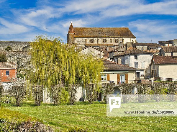View of village from the west with Eglise Saint Etienne Lauzun Lot-et-Garonne Department Nouvelle Aquitaine France.