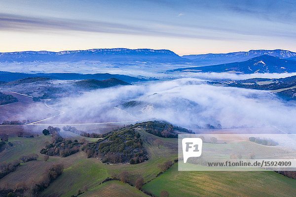 Agricultural area and fog. Aerial view. Ayegui area. Navarre Spain Europe.