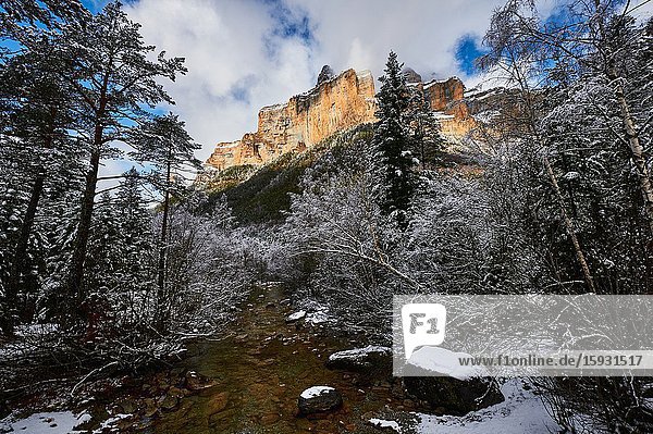 Pyrenees: Arazas river along snowy alpine landscape in the National park of Ordesa and Monte Perdido (Huesca province Aragon region Spain)