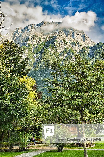 Bavarian Alps viewed from public garden in Mittenwald Bavaria Germany.