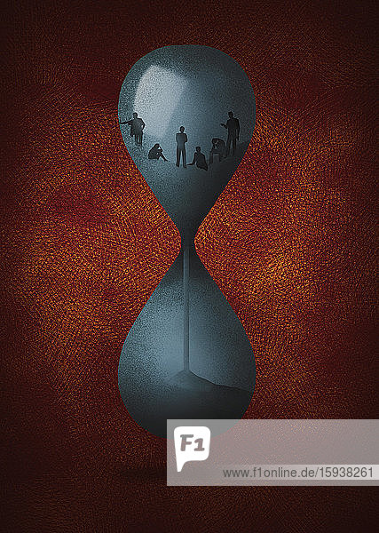 Zeit läuft ab für Menschen in einer Sanduhr