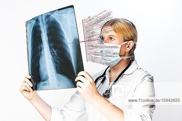 Digital Composing  Doctor looking at X-ray image in augmented reality  Austria  Europe