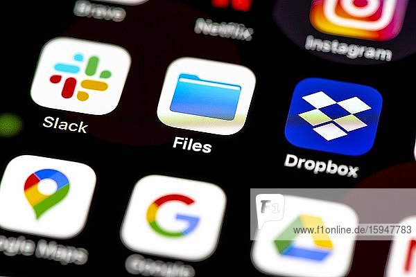 Slack Apple Files Dropbox App Icons auf einem Handy Display iPhone Smartphone Nahaufnahme