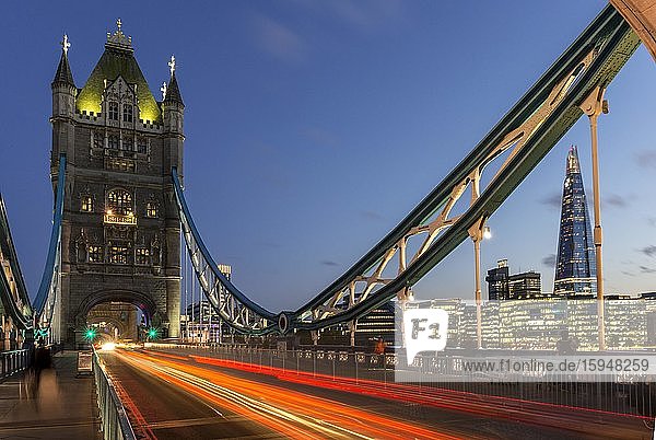 Tower Bridge in the evening  light tracks of passing cars  London  England  Great Britain