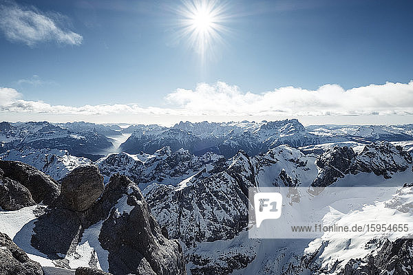 Italy  Trentino  Sun shining over scenic landscape seen from summit of Marmolada mountain