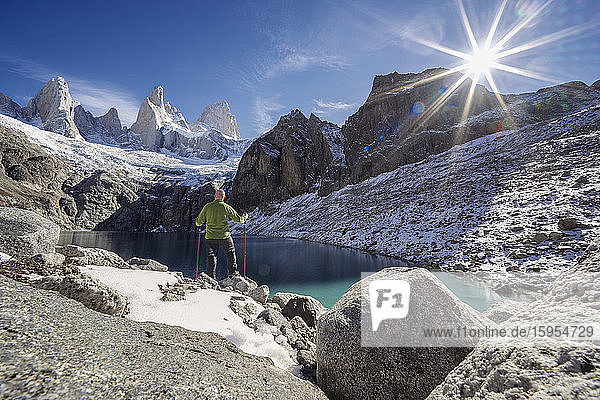 Hiker in front of Mount Fitz Roy at the Laguna Sucia  El Chalten  Patagonia  Argentina
