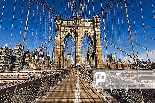 Brooklyn Bridge  back left Skyline of Lower Manhattan  Manhattan  New York City  New York  USA  North America