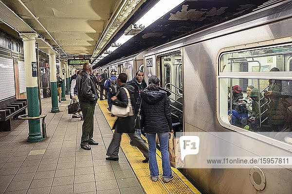 Passengers boarding the subway  Wall Street Station  New York Metro  Financial District  Manhattan  New York City  New York State  USA  North America
