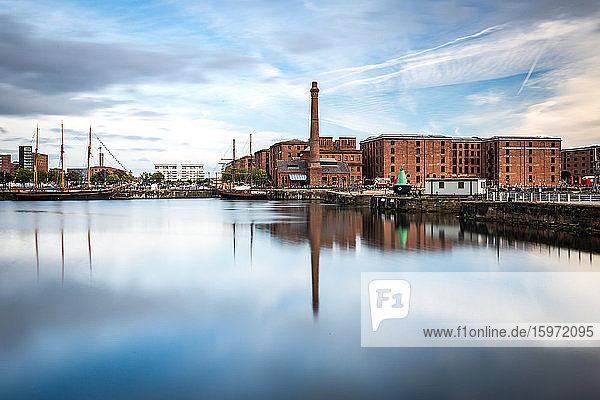 The Pump House pub and Albert Dock buildings reflected in a still Canning Dock  Liverpool  Merseyside  England  United Kingdom  Europe