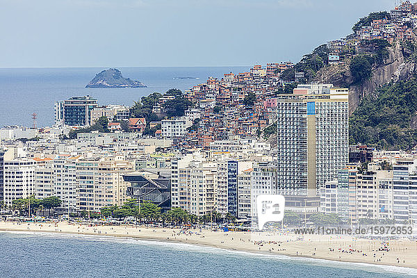Elevated view of Copacabana Beach  apartment blocks and the Pavao Pavaozinhao favela slum  Rio de Janeiro  Brazil  South America