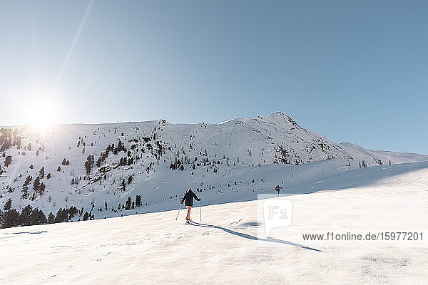 Austria  Carinthia  Reichenau  Nockberge  Falkert  Man ski touring on sunny day