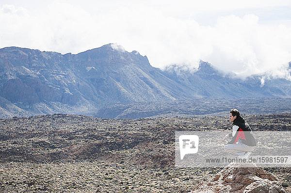 Hiker on viewpoint in Teide National Park  Tenerife  Balearic Islands  Spain