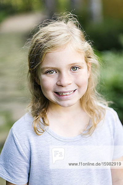 Portrait of smiling girl (8-9)