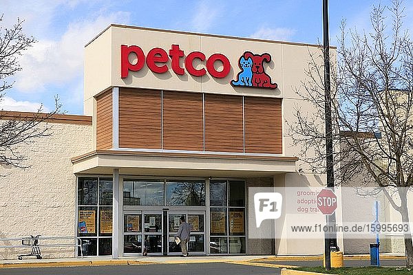 Man and dog enter Petco store  northern Idaho.