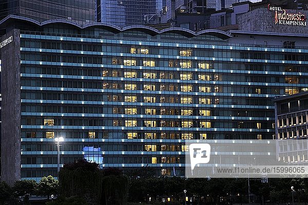 A view shows room lights turned on at a hotel to form the shape of a heart in support of the fight against the COVID-19 coronavirus in Jakarta on April 25 2020. The action was carried out as a symbol of support gratitude and love for medical workers as the frontline in handling the Coronavirus COVID-19 pandemic Indonesia.