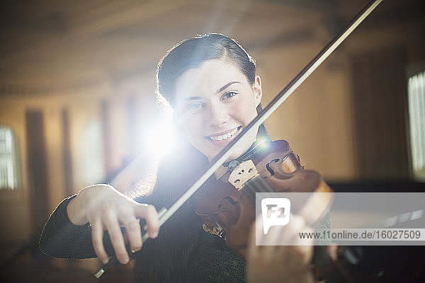 Portrait of violinist performing