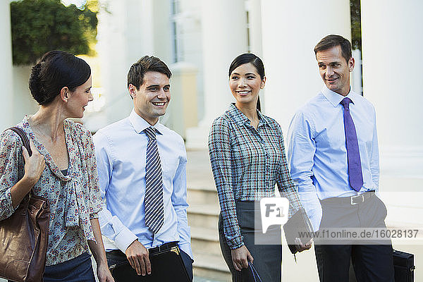 Business people walking outdoors